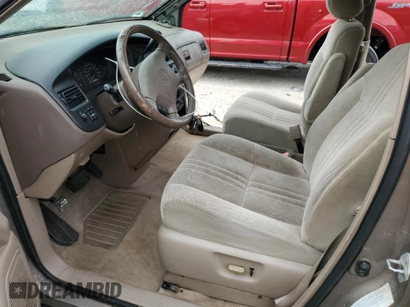 1999 Toyota Sienna LE with VIN 4T3ZF13C9XU167304, listed as a Copart auction lot 81339034 with 173,504 mi miles and Non Repairable. Bid and sale history available at carsss.com. Image 7.
