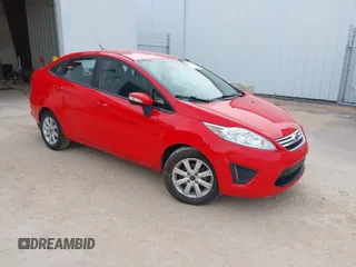 2013 Ford Fiesta SE z VIN 3FADP4BJ5DM226036, wystawiony jako IAAI lot #41914388 z przebiegiem 117 428 mil mil oraz . Historia ofert i sprzedaży dostępna na DreamBid. Obrazek 1.