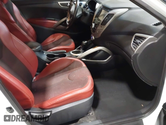 2012 Hyundai Veloster w/Black Int with VIN KMHTC6AD3CU080878, listed as a IAAI auction lot 42377636 with 152,430 mi miles and . Bid and sale history available at DreamBid. Image 5.