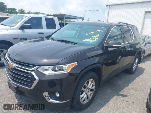 2019 Chevrolet Traverse LT Cloth z VIN 1GNEVGKW3KJ102804, wystawiony jako IAAI lot #42492949 z przebiegiem 144 895 mil mil oraz . Historia ofert i sprzedaży dostępna na DreamBid. Obrazek 18.