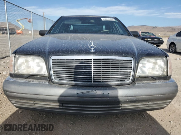 1995 Mercedes-Benz S with VIN WDBGA43E9SA233994, listed as a Copart auction lot 65867264 with 655,674 mi miles and Salvage Title. Bid and sale history available at DreamBid. Image 5.