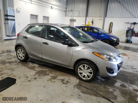 2012 Mazda Mazda2 Sport with VIN JM1DE1KY2C0150739, listed as a Copart auction lot 50942935 with 82,123 mi miles and Clean Title. Bid and sale history available at carsss.com. Image 4.