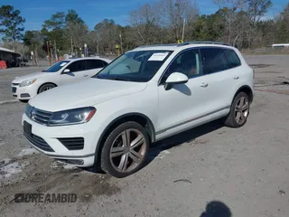 2016 Volkswagen Touareg Sport with VIN WVGEF9BP5GD012680, listed as a IAAI auction lot 41610943 with 153,952 mi miles and . Bid and sale history available at DreamBid. Image 17.