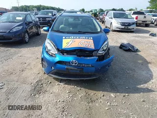 2018 Toyota Prius One with VIN JTDKDTB33J1602571, listed as a IAAI auction lot 42710336 with 166,439 mi miles and . Bid and sale history available at DreamBid. Image 12.