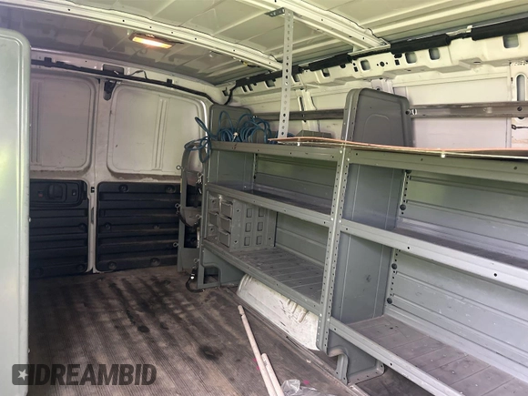 2014 Chevrolet Express Cargo with VIN 1GCWGFCG7E1132515, listed as a IAAI auction lot 42729868 with 179,071 mi miles and . Bid and sale history available at DreamBid. Image 4.