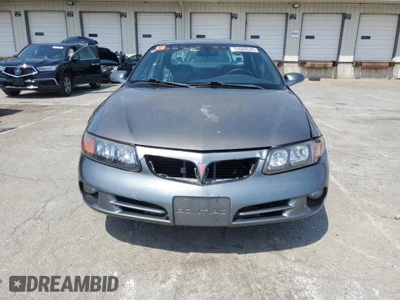 2004 Pontiac Bonneville SE z VIN 1G2HX52K94U178888, wystawiony jako Copart lot #51669505 z przebiegiem 184 886 mil mil oraz Szkoda całkowita • Salvage title. Historia ofert i sprzedaży dostępna na DreamBid. Obrazek 5.