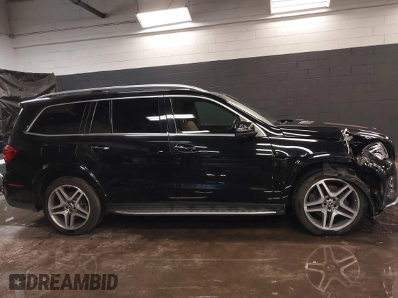 2018 Mercedes-Benz GLS 550 with VIN 4JGDF7DE1JB070994, listed as a IAAI auction lot 41676076 with 104,748 mi miles and . Bid and sale history available at DreamBid. Image 13.