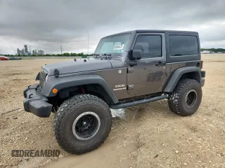2014 Jeep Wrangler Sport с VIN 1C4AJWAG8EL226227, выставлен на аукционе Copart как лот 60643475 с пробегом 98 731 миль миль и Списание • Salvage title. История ставок и продаж доступна на DreamBid. Изображение 1.