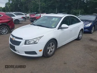 2014 Chevrolet Cruze 1LT with VIN 1G1PC5SB6E7192324, listed as a IAAI auction lot 42783725 with 191,784 mi miles and . Bid and sale history available at DreamBid. Image 2.
