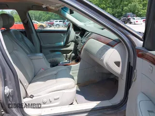2007 Cadillac DTS Luxury I z VIN 1G6KD57Y37U116319, wystawiony jako IAAI lot #42401901 z przebiegiem 109 737 mil mil oraz . Historia ofert i sprzedaży dostępna na DreamBid. Obrazek 5.