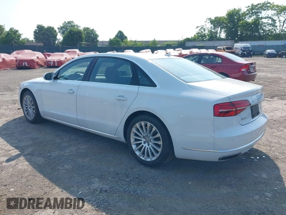 2015 Audi A8 3.0T z VIN WAU3GAFD4FN020897, wystawiony jako IAAI lot #42480222 z przebiegiem 68 894 mil mil oraz . Historia ofert i sprzedaży dostępna na DreamBid. Obrazek 3.