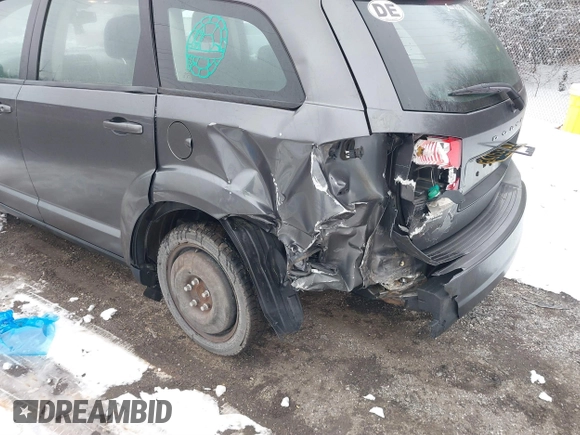 2014 Dodge Journey SE with VIN 3C4PDCAB0ET182376, listed as a IAAI auction lot 41569006 with 106,024 mi miles and . Bid and sale history available at DreamBid. Image 6.