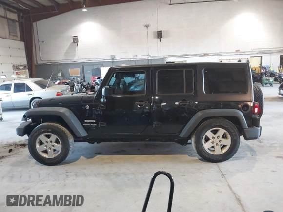 2018 Jeep Wrangler Unlimited Sport S with VIN 1C4HJWDG5JL888349, listed as a IAAI auction lot 40764318 with 61,419 mi miles and . Bid and sale history available at DreamBid. Image 14.