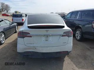 2018 Tesla Model X 75D with VIN 5YJXCBE27JF121834, listed as a IAAI auction lot 41769246 with 90,814 mi miles and . Bid and sale history available at carsss.com. Image 16.