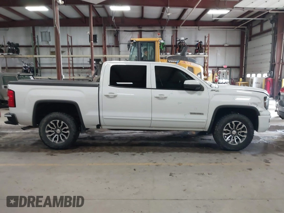 2017 GMC Sierra 1500 SLE z VIN 3GTU2MEC4HG374723, wystawiony jako IAAI lot #41400381 z przebiegiem 141 896 mil mil oraz . Historia ofert i sprzedaży dostępna na DreamBid. Obrazek 13.