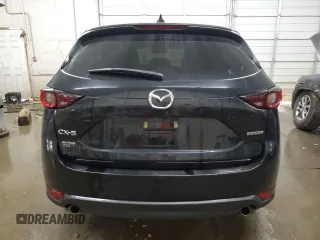 2021 Mazda CX-5 Touring with VIN JM3KFACM5M1347827, listed as a Copart auction lot 49665965 with 46,636 mi miles and Salvage Title. Bid and sale history available at carsss.com. Image 6.