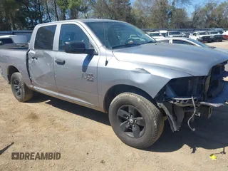 2022 Ram 1500 SLT z VIN 1C6RR6LG0NS203367, wystawiony jako IAAI lot #41801911 z przebiegiem 63 864 mil mil oraz . Historia ofert i sprzedaży dostępna na DreamBid. Obrazek 1.