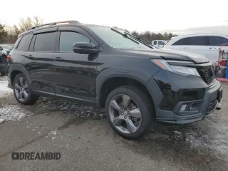 2021 Honda Passport Touring with VIN 5FNYF8H96MB007268, listed as a Copart auction lot 89077285 with 63,232 mi miles and Salvage Title. Bid and sale history available at carsss.com. Image 4.