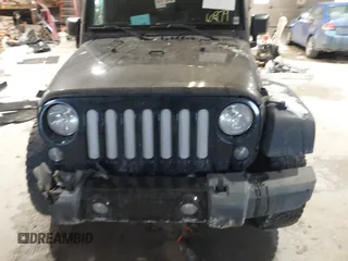 2016 Jeep Wrangler Unlimited Sport with VIN 1C4BJWDG2GL210060, listed as a IAAI auction lot 41546979 with 13,542 mi miles and . Bid and sale history available at DreamBid. Image 12.
