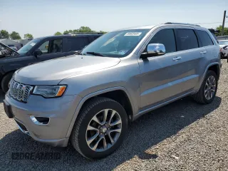 2018 Jeep Grand Cherokee Overland with VIN 1C4RJFCG2JC212947, listed as a Copart auction lot 59503405 with 76,436 mi miles and Clean title. Bid and sale history available at DreamBid. Image 1.