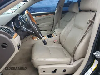 2012 Chrysler 300 C with VIN 2C3CCAKTXCH151465, listed as a Copart auction lot 65820264 with 132,609 mi miles and Salvage Title. Bid and sale history available at DreamBid. Image 7.