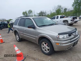 2002 Oldsmobile Bravada z VIN 1GHDT13S822363028, wystawiony jako IAAI lot #42286443 z przebiegiem 185 065 mil mil oraz . Historia ofert i sprzedaży dostępna na DreamBid. Obrazek 1.