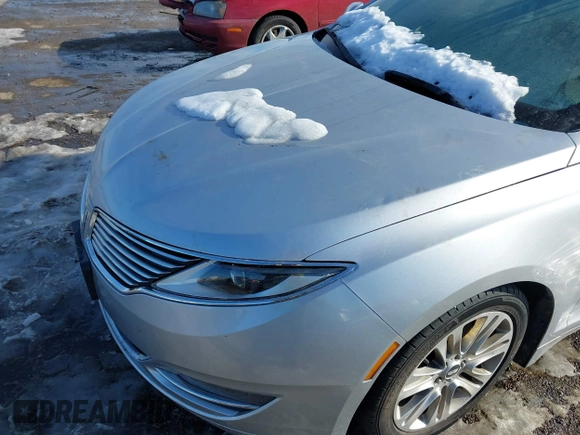 2014 Lincoln MKZ z VIN 3LN6L2G99ER825605, wystawiony jako IAAI lot #41296771 z przebiegiem 195 838 mil mil oraz . Historia ofert i sprzedaży dostępna na DreamBid. Obrazek 6.