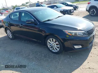 2014 Kia Optima LX z VIN 5XXGM4A73EG326242, wystawiony jako IAAI lot #42470973 z przebiegiem 171 412 mil mil oraz . Historia ofert i sprzedaży dostępna na DreamBid. Obrazek 1.