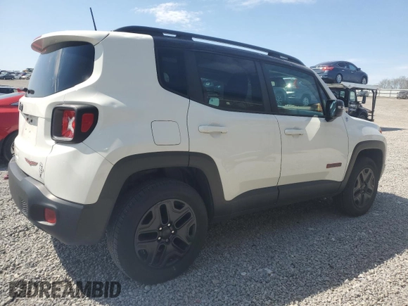 2018 Jeep Renegade Trailhawk with VIN ZACCJBCB2JPG87075, listed as a Copart auction lot 52492795 with 127,596 mi miles and Salvage title. Bid and sale history available at DreamBid. Image 3.