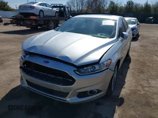 2014 Ford Fusion Titanium Hybrid with VIN 3FA6P0RU9ER147443, listed as a IAAI auction lot 41739540 with 146,359 mi miles. Bid and sale history available at carsss.com. Image 18.