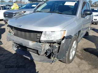 2011 Jeep Compass with VIN 1J4NT1FA4BD139153, listed as a IAAI auction lot 41665481 with 164,412 mi miles. Bid and sale history available at carsss.com. Image 6.