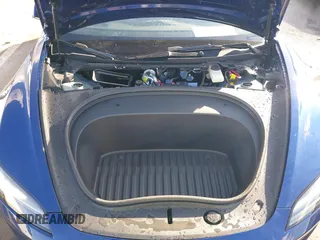 2025 Tesla Model 3 Long Range with VIN 5YJ3E1EA2SF915586, listed as a IAAI auction lot 41495870 with 4 mi miles and . Bid and sale history available at DreamBid. Image 10.