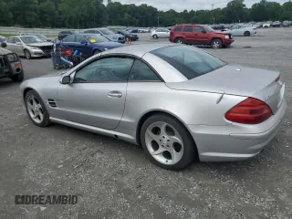 2005 Mercedes-Benz SL 500 with VIN WDBSK75F95F104935, listed as a Copart auction lot 60493705 with 89,994 mi miles and Salvage title. Bid and sale history available at DreamBid. Image 2.