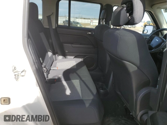 2010 Jeep Patriot Sport with VIN 1J4NF2GB2AD525475, listed as a Copart auction lot 51986785 with 90,659 mi miles and Salvage Title. Bid and sale history available at carsss.com. Image 11.