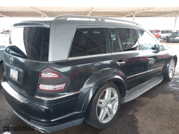 2012 Mercedes-Benz GL-Class GL 550 with VIN 4JGBF8GE4CA783163, listed as a IAAI auction lot 41756700 with 220,571 mi miles. Bid and sale history available at carsss.com. Image 4.