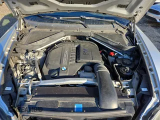 2011 BMW X5 35i with VIN 5UXZV4C54BL410887, listed as a Copart auction lot 77017594 with 111,629 mi miles and Clean Title. Bid and sale history available at carsss.com. Image 7.