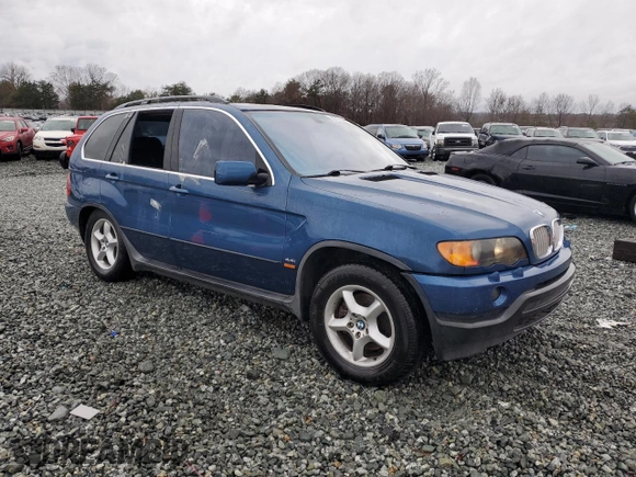 2001 BMW X5 4.4i with VIN WBAFB33541LH25534, listed as a Copart auction lot 82701244 with 240,611 mi miles and Clean Title. Bid and sale history available at carsss.com. Image 4.