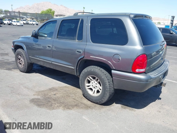 2001 Dodge Durango z VIN 1B4HS28N81F643555, wystawiony jako IAAI lot #42725611 z przebiegiem 271 428 mil mil oraz . Historia ofert i sprzedaży dostępna na DreamBid. Obrazek 3.