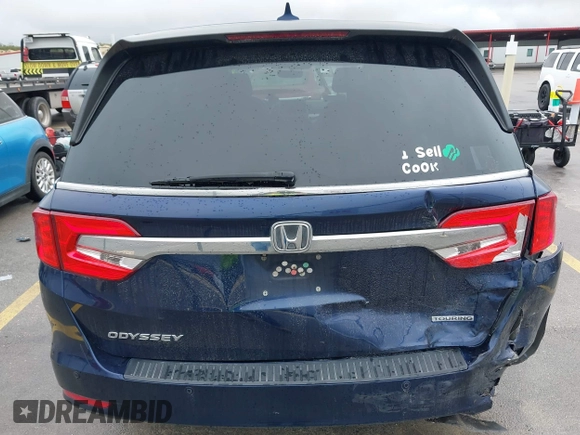 2018 Honda Odyssey Touring with VIN 5FNRL6H85JB001501, listed as a IAAI auction lot 41911497 with 92,407 mi miles. Bid and sale history available at carsss.com. Image 6.