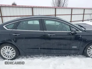 2016 Ford Fusion Energi SE Luxury with VIN 3FA6P0PU3GR166009, listed as a IAAI auction lot 41626623 with 133,596 mi miles. Bid and sale history available at carsss.com. Image 14.