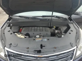 2015 Chevrolet Traverse LS z VIN 1GNKRFED6FJ113457, wystawiony jako Copart lot #74671954 z przebiegiem Nie podano mil oraz Szkoda całkowita • Salvage title. Historia ofert i sprzedaży dostępna na DreamBid. Obrazek 12.