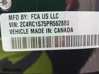 2023 Chrysler Pacifica Hybrid Limited with VIN 2C4RC1S75PR562880, listed as a IAAI auction lot 41966611 with 10,867 mi miles. Bid and sale history available at carsss.com. Image 9.