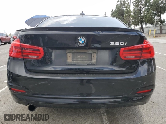 2016 BMW 3 Series 320i with VIN WBA8A9C51GK617172, listed as a Copart auction lot 51018965 with 119,313 mi miles and Salvage Title. Bid and sale history available at carsss.com. Image 6.