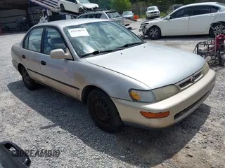 1996 Toyota Corolla DX with VIN 1NXBB02E5TZ382918, listed as a IAAI auction lot 42434675 with 228,488 mi miles and . Bid and sale history available at DreamBid. Image 1.