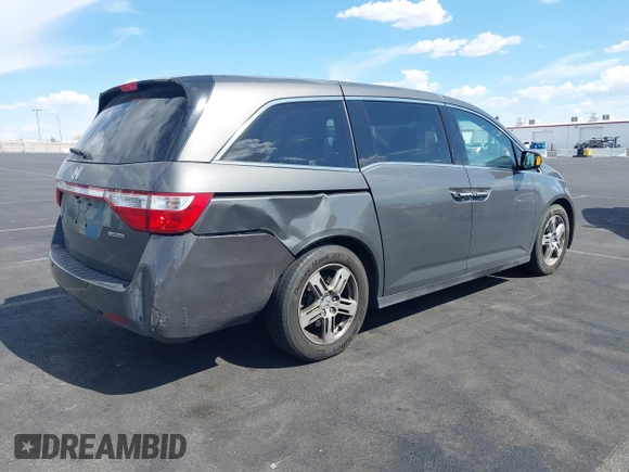 2013 Honda Odyssey Touring with VIN 5FNRL5H95DB045666, listed as a IAAI auction lot 42117219 with 50,715 mi miles and . Bid and sale history available at carsss.com. Image 6.