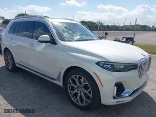 2021 BMW X7 xDrive40i with VIN 5UXCW2C03M9F63758, listed as a IAAI auction lot 41708939 with 57,872 mi miles. Bid and sale history available at carsss.com. Image 1.
