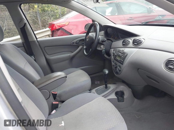 2004 Ford Focus ZTW z VIN 1FAFP35Z44W111027, wystawiony jako IAAI lot #41762414 z przebiegiem 155 535 mil mil oraz . Historia ofert i sprzedaży dostępna na DreamBid. Obrazek 5.