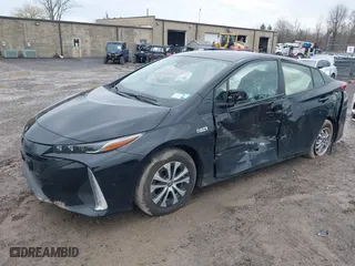 2021 Toyota Prius Prime LE with VIN JTDKAMFP2M3165859, listed as a IAAI auction lot 41943098 with 20,306 mi miles. Bid and sale history available at carsss.com. Image 18.