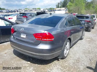 2014 Volkswagen Passat SEL Premium with VIN 1VWCS7A32EC026868, listed as a IAAI auction lot 42020450 with 90,993 mi miles. Bid and sale history available at carsss.com. Image 4.