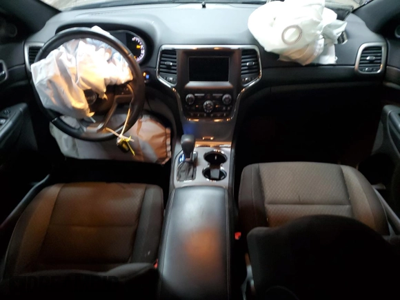 2021 Jeep Grand Cherokee Laredo E with VIN 1C4RJFAG4MC717010, listed as a Copart auction lot 56033035 with 75,054 mi miles and Salvage title. Bid and sale history available at DreamBid. Image 8.